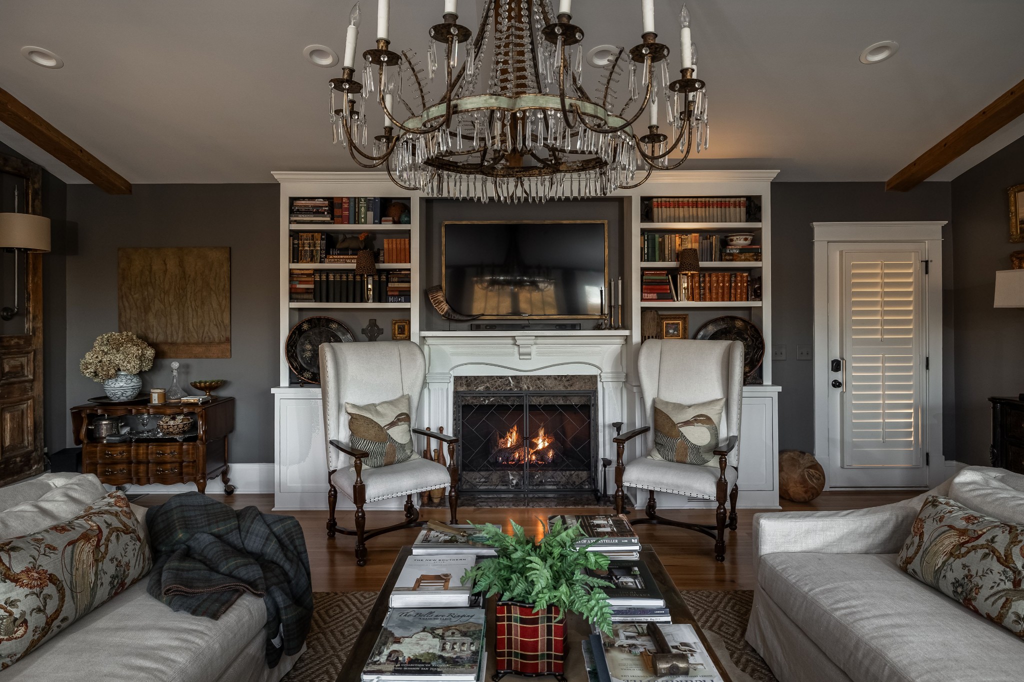 6537 Arno-College Grove Road College Grove, TN 37046 - Photo 17 of 75 a living room with furniture a fireplace and a chandelier