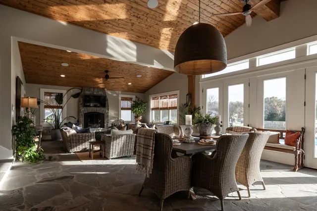a view of living room with furniture and floor to ceiling window