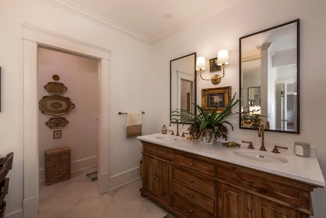 a living room with furniture a fireplace and next to a window