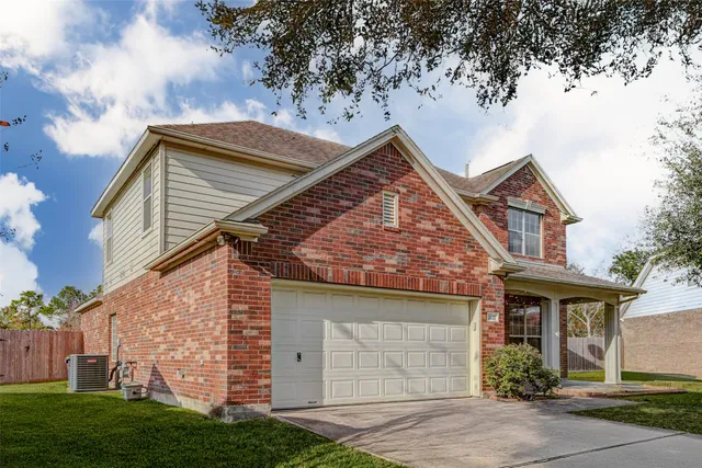 a front view of house with yard