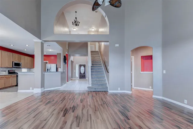 a view of a living room and wooden floor