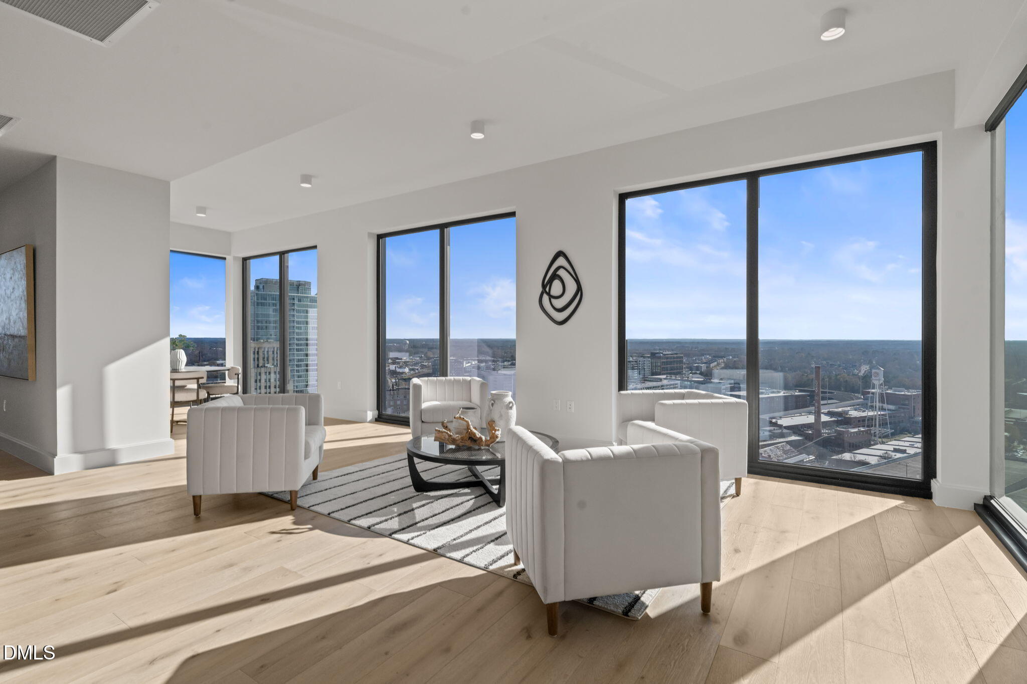 115 Morris Street, Unit 2205 Durham, NC 27701 - Photo 15 of 83 a living room with furniture and a floor to ceiling window