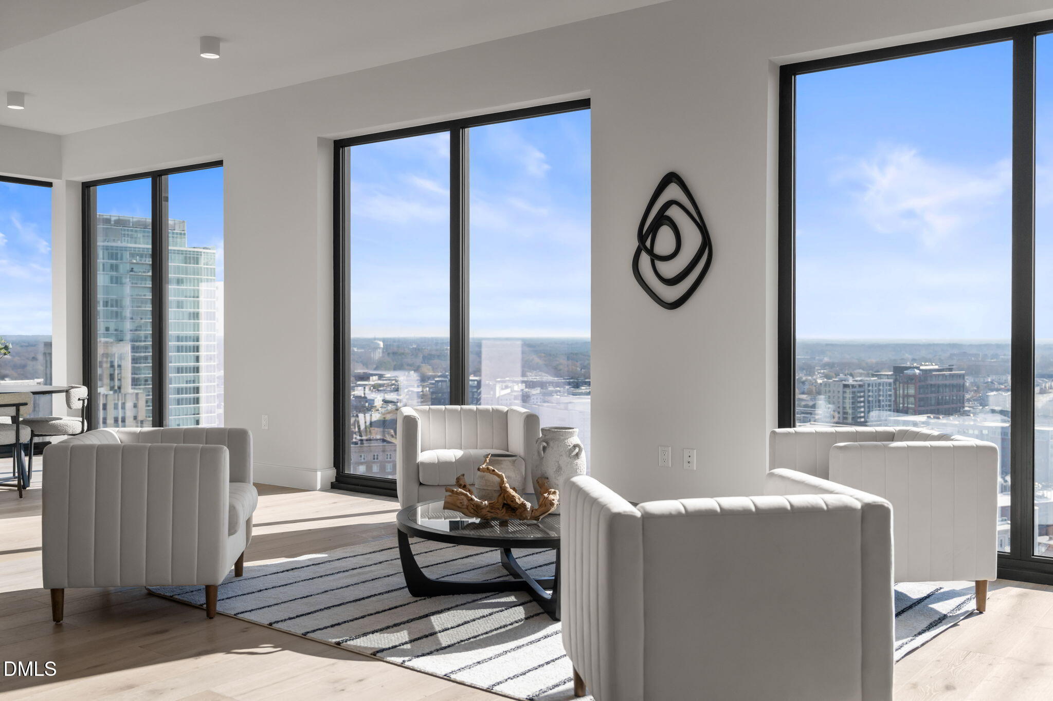 115 Morris Street, Unit 2205 Durham, NC 27701 - Photo 16 of 83 a living room with furniture and a large window