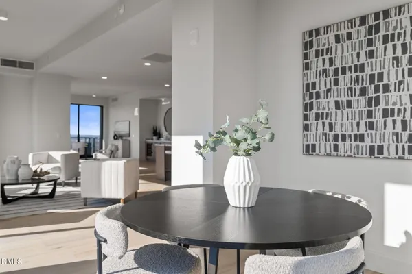 a vase of flowers sitting on a table