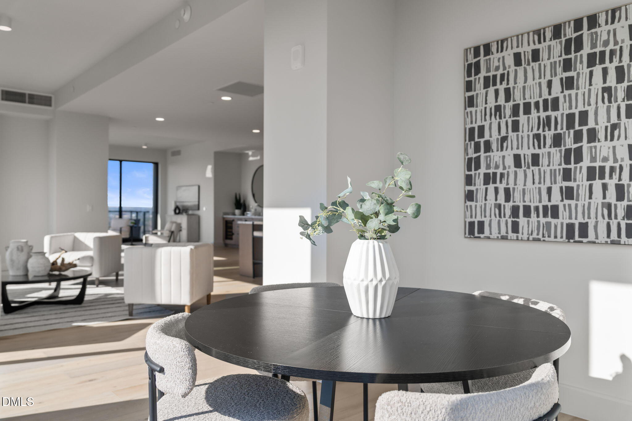 115 Morris Street, Unit 2205 Durham, NC 27701 - Photo 22 of 83 a view of a dining room with furniture and wooden floor