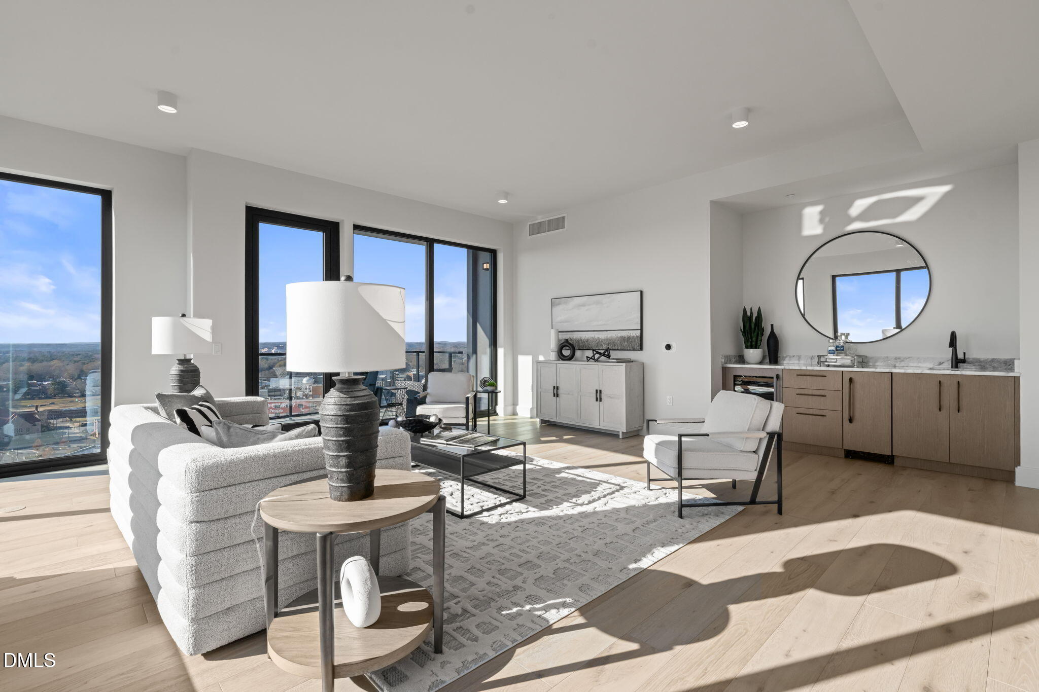115 Morris Street, Unit 2205 Durham, NC 27701 - Photo 24 of 83 a living room with fireplace furniture and a wooden floor