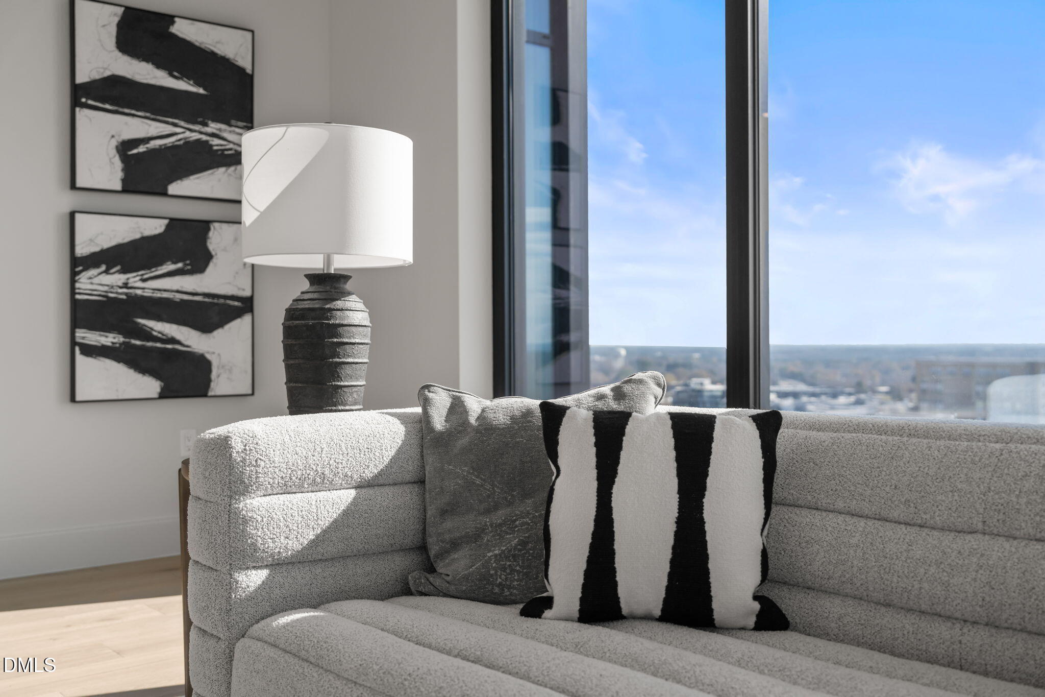 115 Morris Street, Unit 2205 Durham, NC 27701 - Photo 26 of 83 a living room with furniture and a lamp