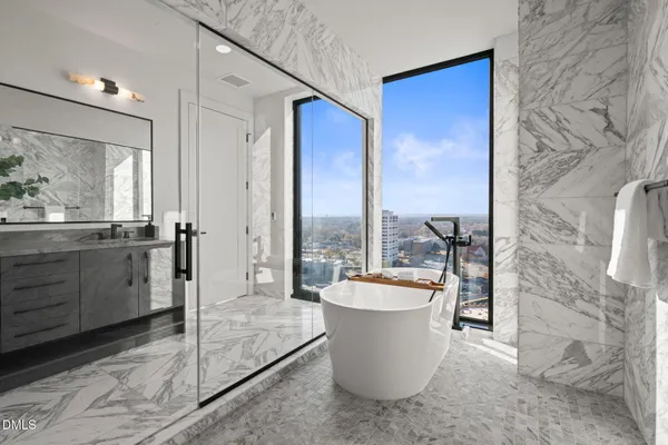 a view of city with tall buildings