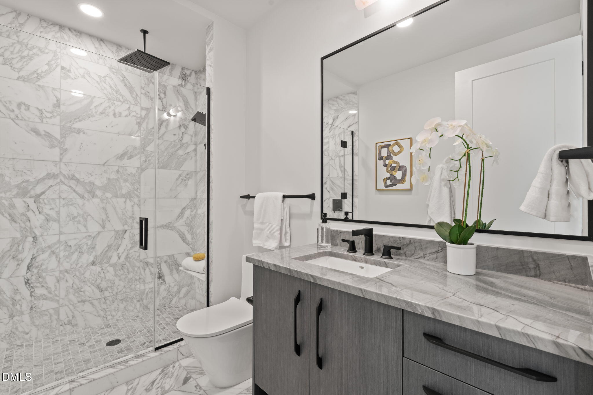 115 Morris Street, Unit 2205 Durham, NC 27701 - Photo 58 of 83 a bathroom with a granite countertop sink toilet and shower