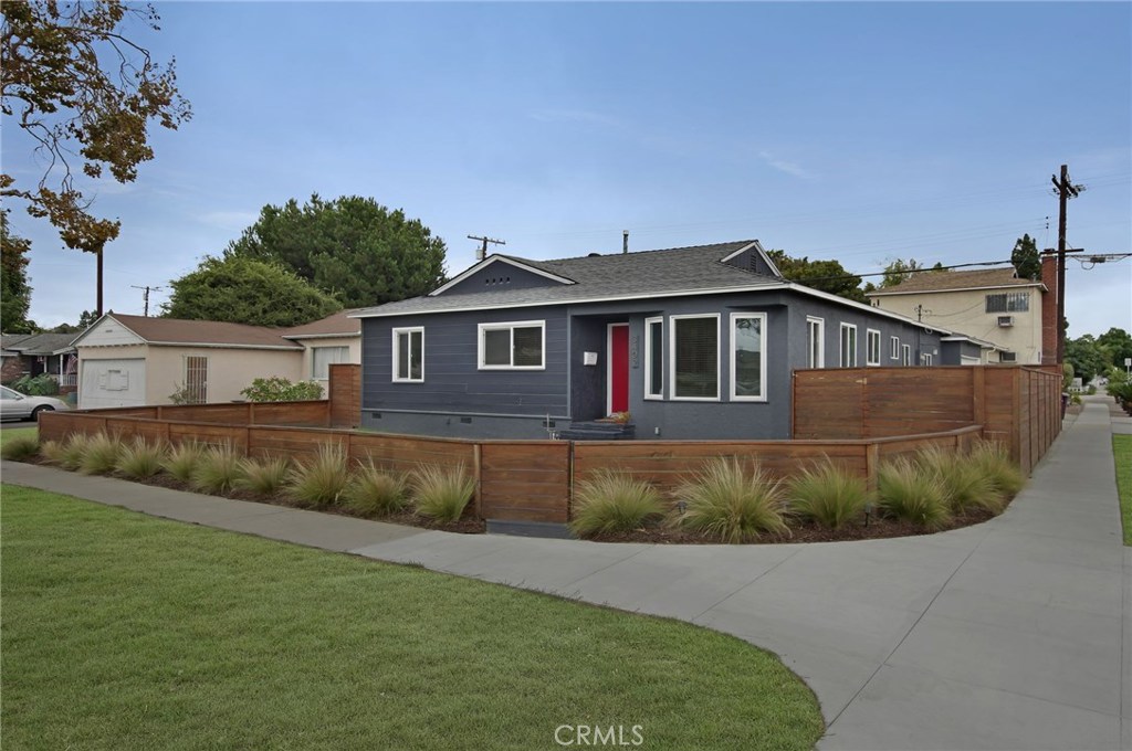 3402 North Studebaker Road Long Beach, CA 90808 - Photo 1 of 1 Gorgeous curb appeal! Double pane windows throughout the house. Grass in foreground digitally enhanced