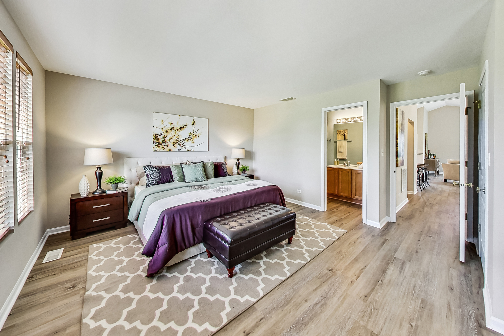 1052 Reserve Drive Elgin, IL 60123 - Photo 18 of 40 a spacious bedroom with a bed and a table