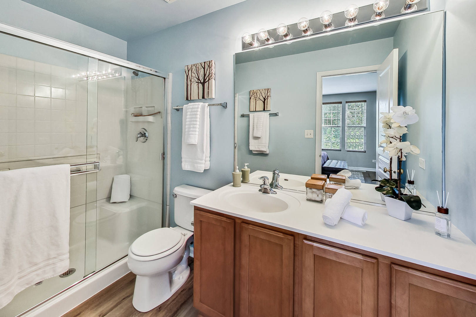 1052 Reserve Drive Elgin, IL 60123 - Photo 21 of 40 a bathroom with a sink a toilet and shower