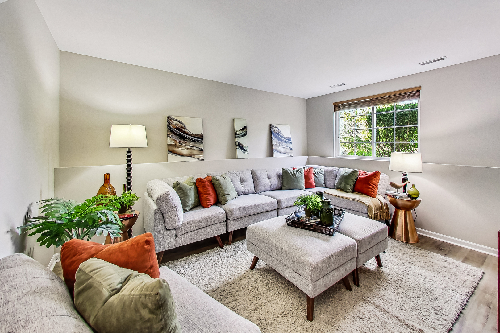 1052 Reserve Drive Elgin, IL 60123 - Photo 25 of 40 a living room with furniture and a large window