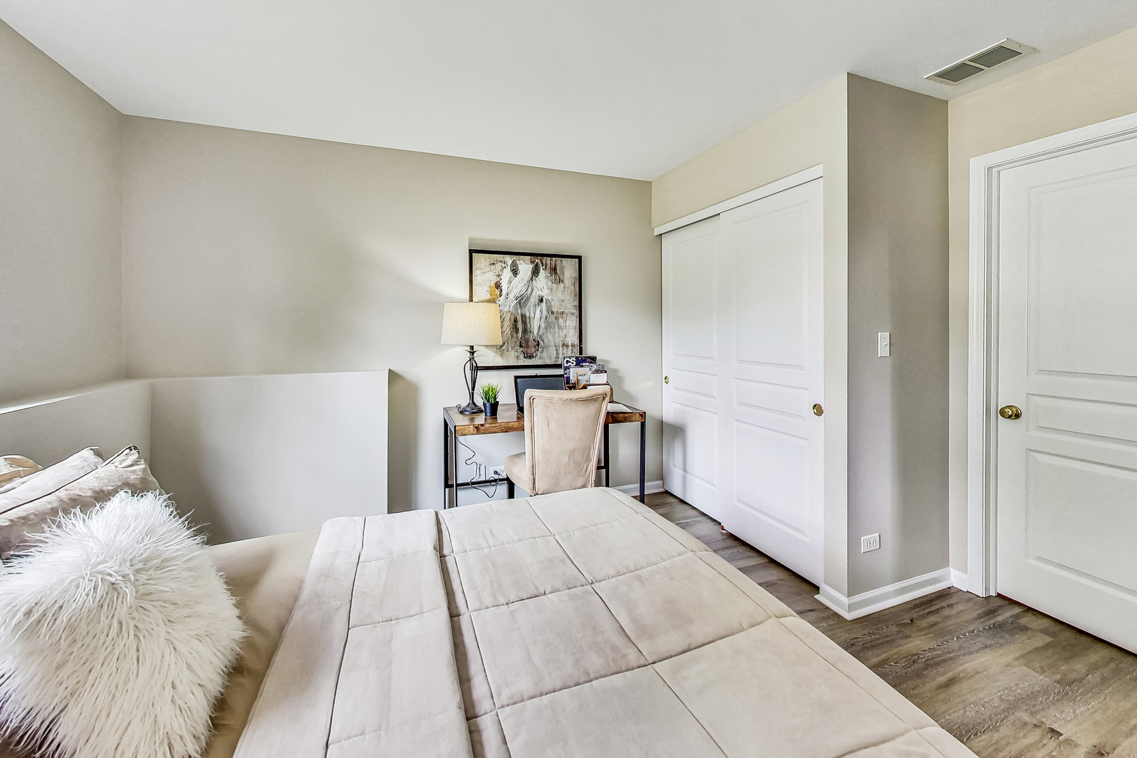 1052 Reserve Drive Elgin, IL 60123 - Photo 29 of 40 a bed room with a bed and a view of kitchen