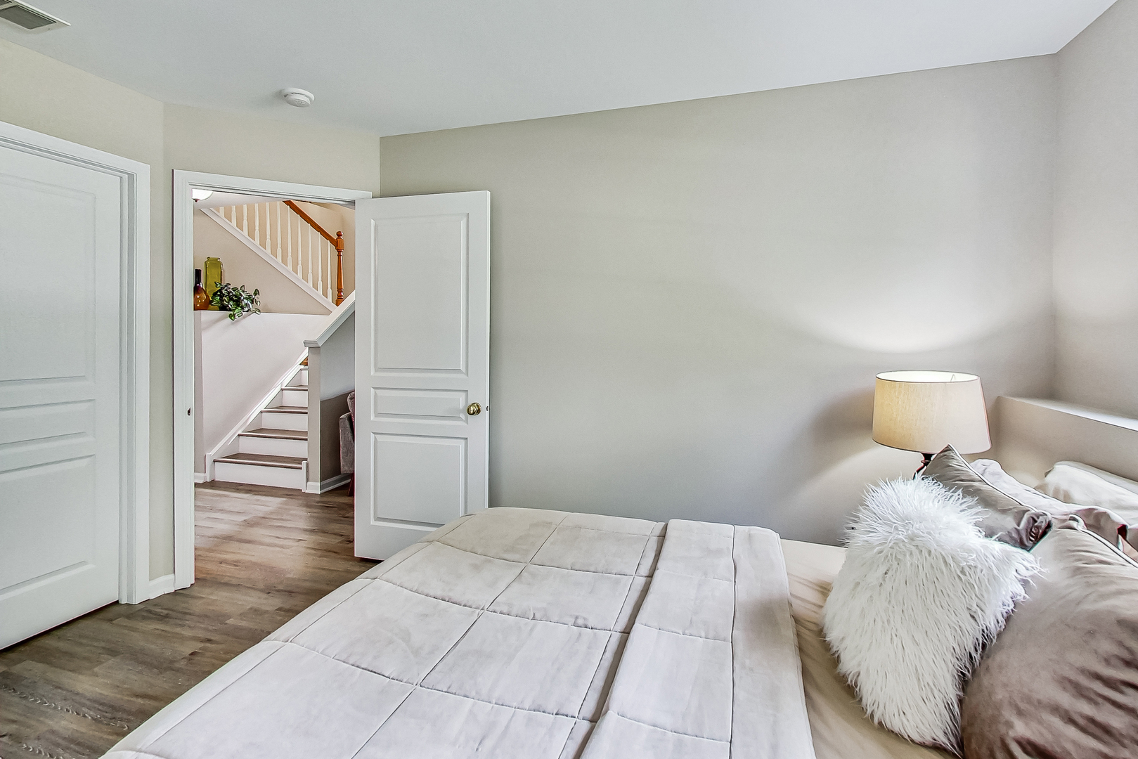 1052 Reserve Drive Elgin, IL 60123 - Photo 30 of 40 a bedroom with a bed and a view of bathroom