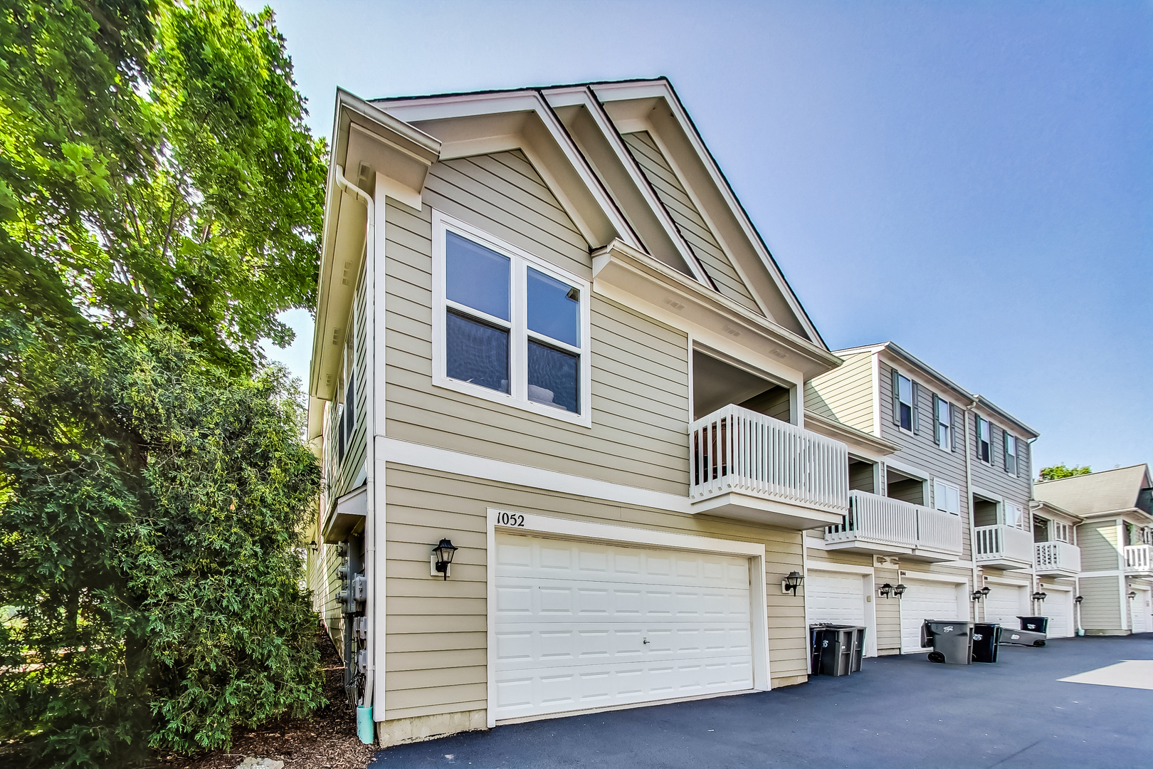 1052 Reserve Drive Elgin, IL 60123 - Photo 35 of 40 a view of a house with a garage
