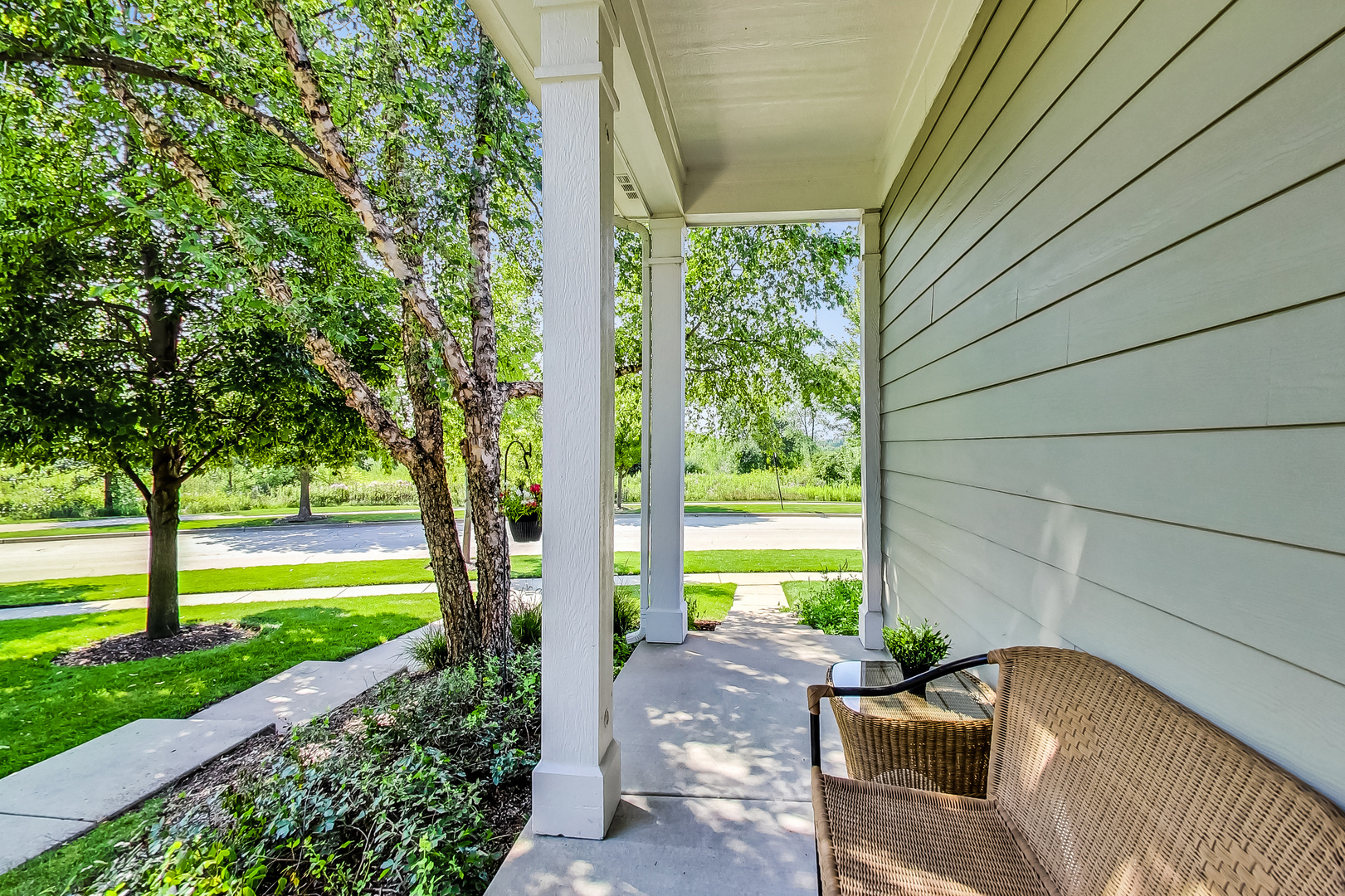 1052 Reserve Drive Elgin, IL 60123 - Photo 5 of 40 a view of a patio with couches plants and large garden