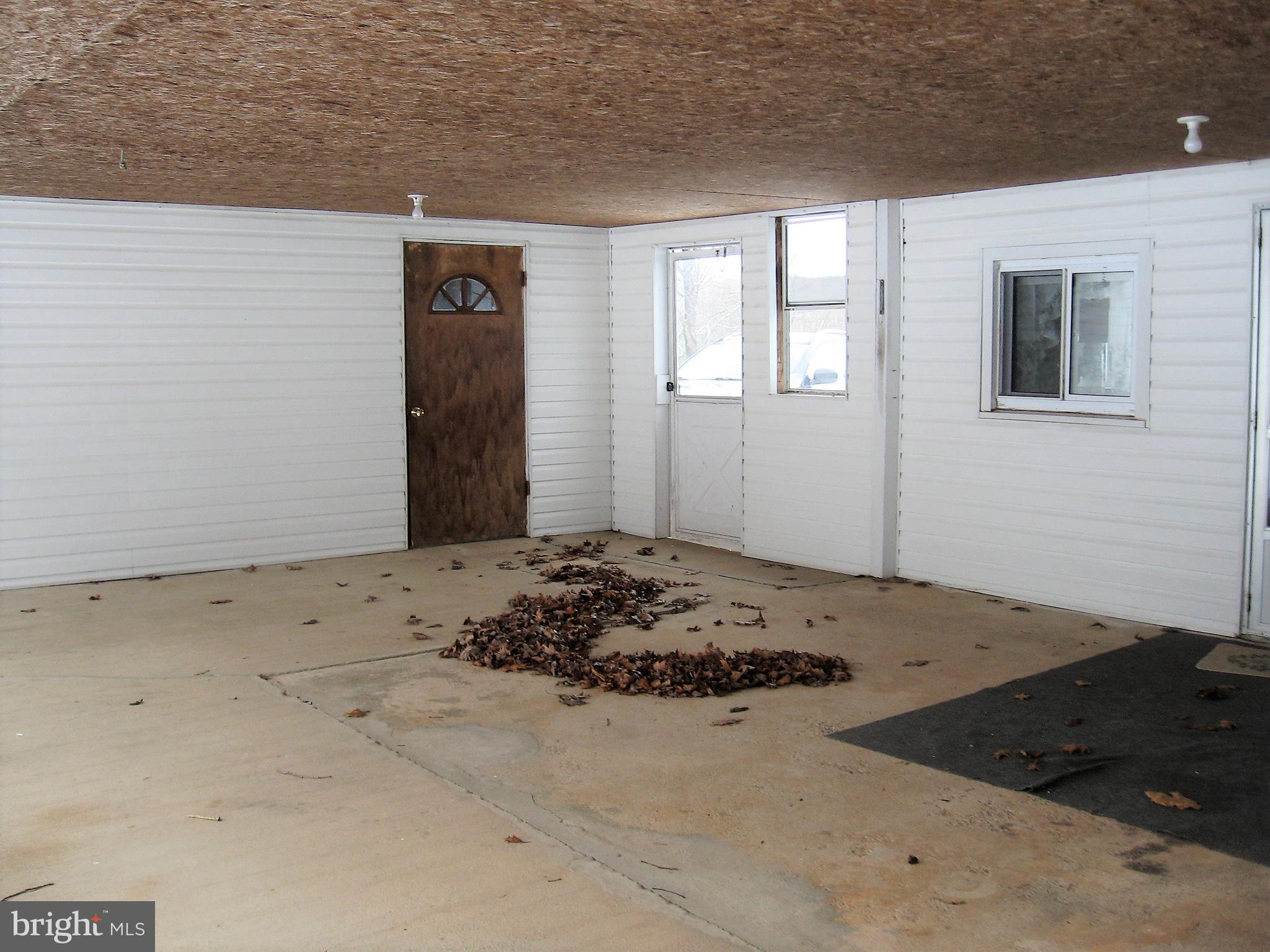 2562 Virginia Line Road Berkeley Springs, WV 25411 - Photo 21 of 45 covered patio