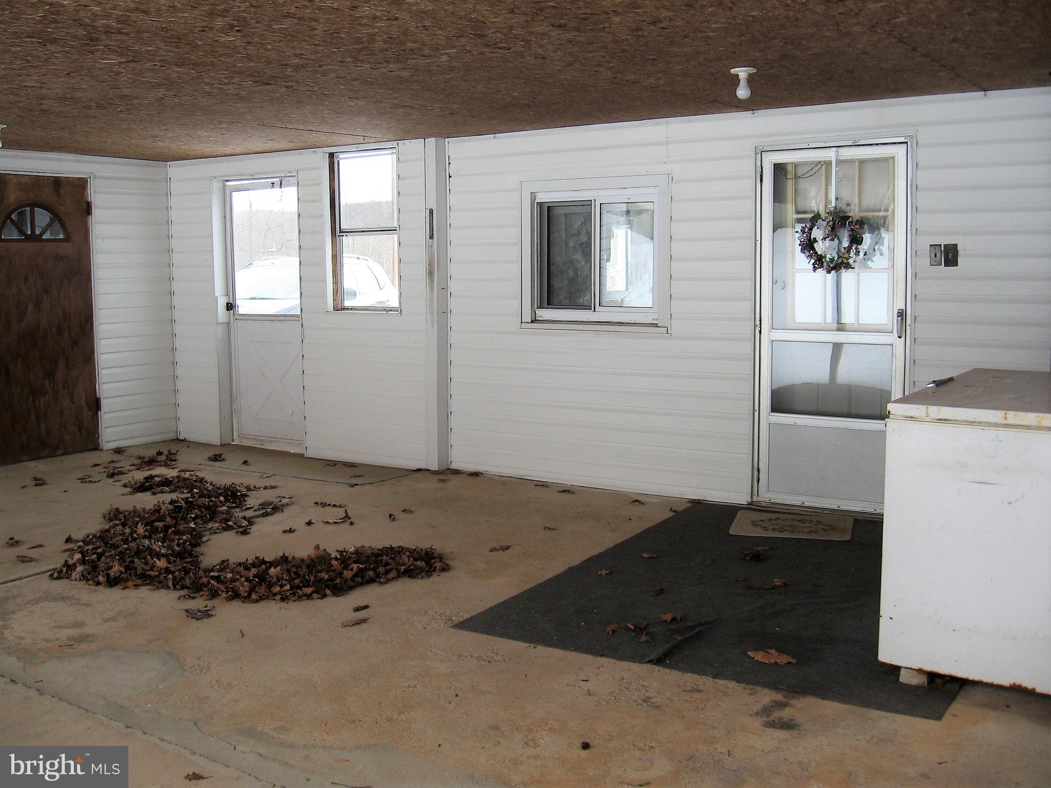 2562 Virginia Line Road Berkeley Springs, WV 25411 - Photo 22 of 45 covered patio