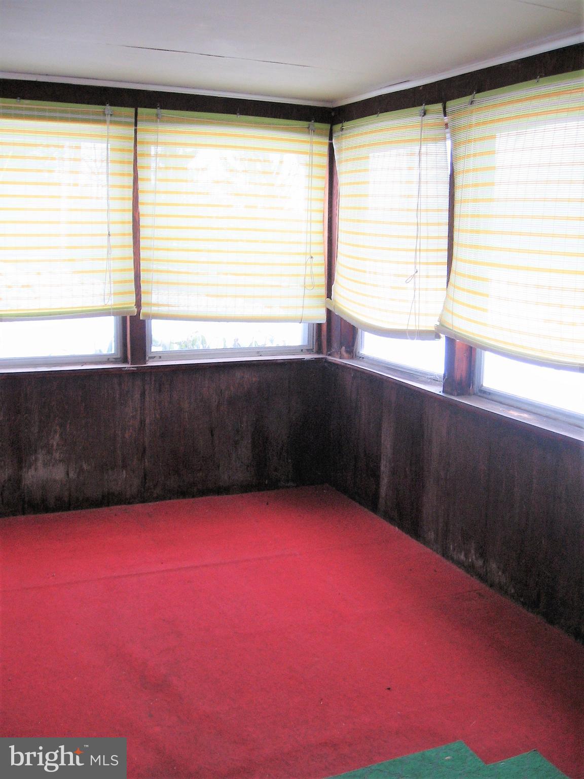 2562 Virginia Line Road Berkeley Springs, WV 25411 - Photo 33 of 45 enclosed front porch