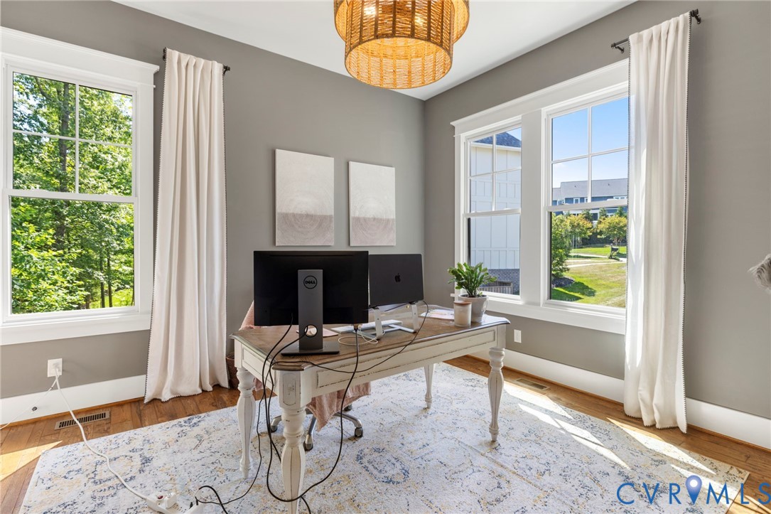 1925 Muswell Court Midlothian, VA 23112 - Photo 30 of 64 Room featuring four large windows with white trim,