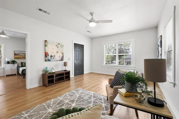 a living room with furniture and a window