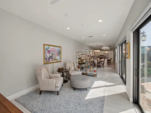 a living room with furniture and a table