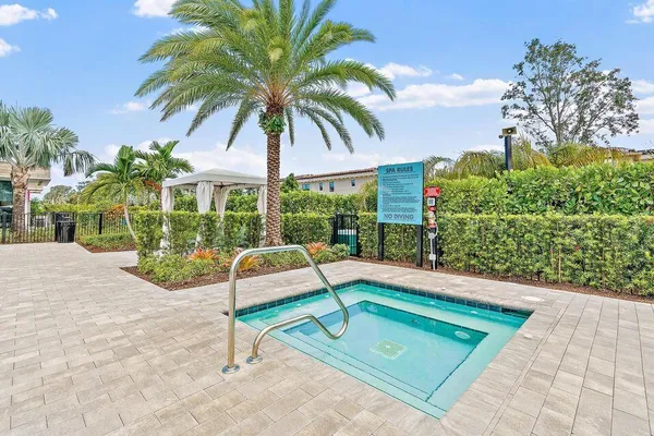a view of a backyard with a patio