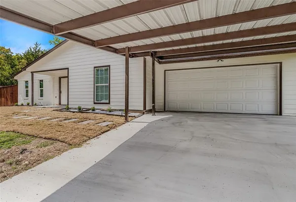 a view of a house with a garage