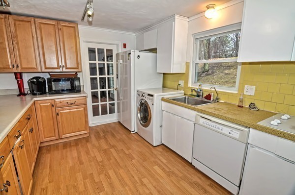 10 Edith Road Framingham, MA 01701 - Photo 14 of 30 a view of a kitchen with electric appliances