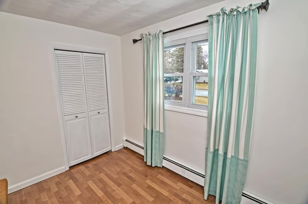10 Edith Road Framingham, MA 01701 - Photo 22 of 30 a view of a room with wooden floor and windows