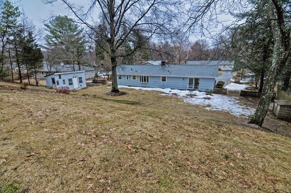 10 Edith Road Framingham, MA 01701 - Photo 28 of 30 a view of a house with a yard covered in snow