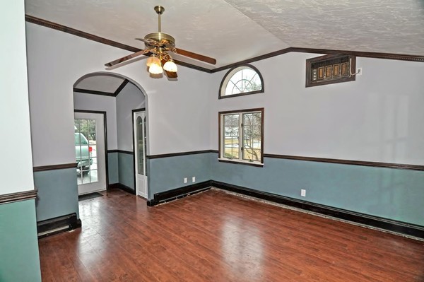 10 Edith Road Framingham, MA 01701 - Photo 8 of 30 a view of empty room with wooden floor and fan