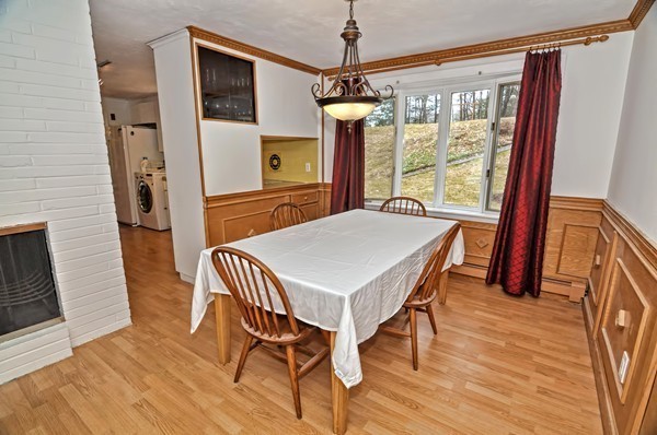 10 Edith Road Framingham, MA 01701 - Photo 9 of 30 a view of a dining room with furniture window and wooden floor