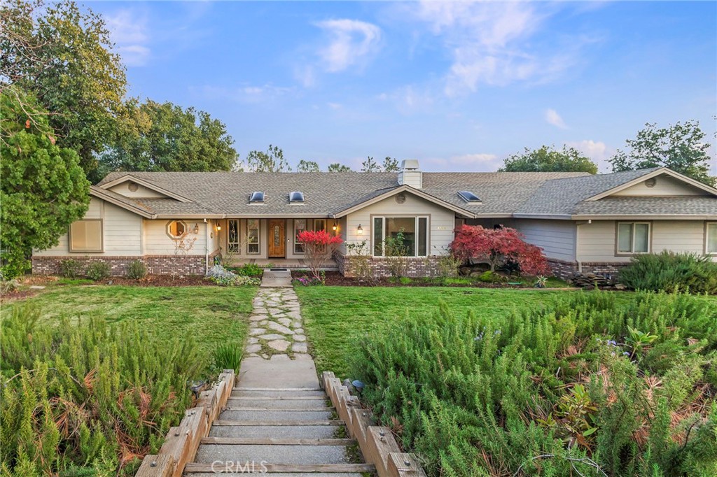 4644 Calernbar Road Paradise, CA 95969 - Photo 1 of 1 a front view of a house with yard