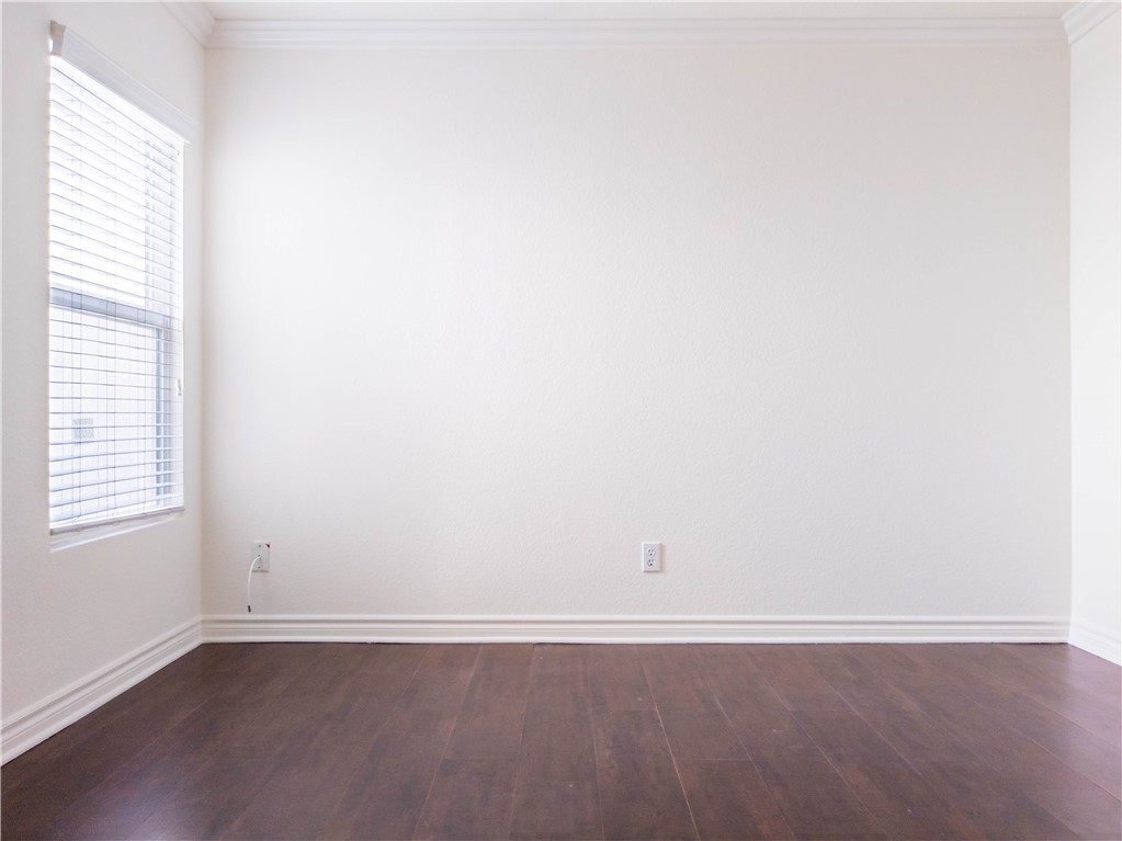 21032 Primrose Lane Mission Viejo, CA 92691 - Photo 12 of 19 an empty room with wooden floor and window