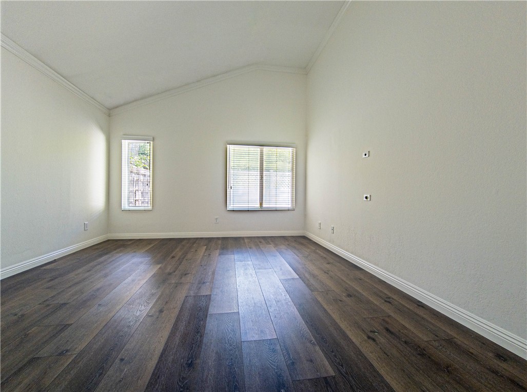 21032 Primrose Lane Mission Viejo, CA 92691 - Photo 13 of 19 an empty room with wooden floor and window