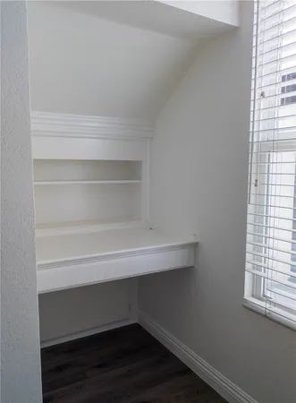 a view of small space with racks on the wall