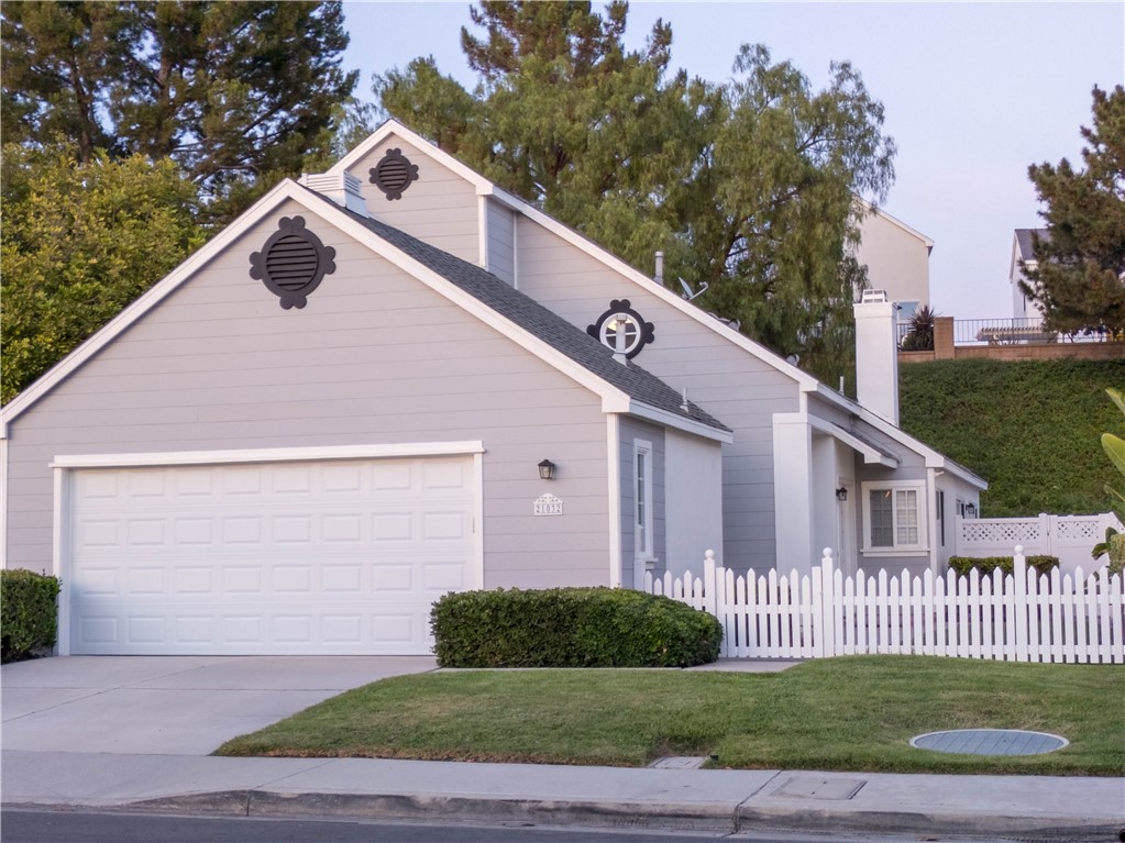 21032 Primrose Lane Mission Viejo, CA 92691 - Photo 7 of 19 a view of a house with a yard