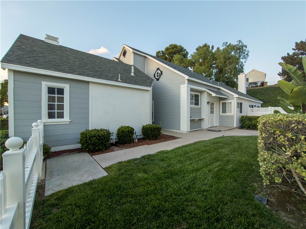 21032 Primrose Lane Mission Viejo, CA 92691 - Photo 8 of 19 a front view of a house with garden