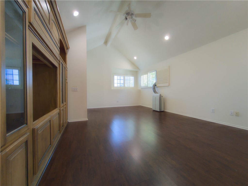 21032 Primrose Lane Mission Viejo, CA 92691 - Photo 9 of 19 an empty room with wooden floor and windows