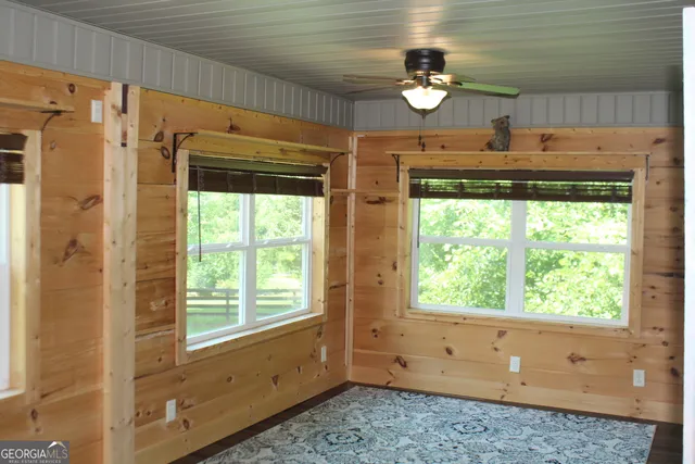 a room with window and cabinet