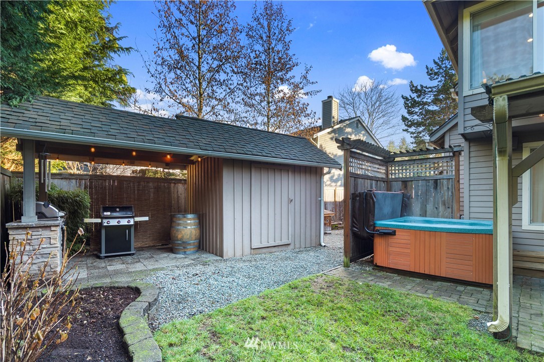 3121 210th Street Southeast Bothell, WA 98021 - Photo 34 of 40 a view of a house with backyard and sitting area