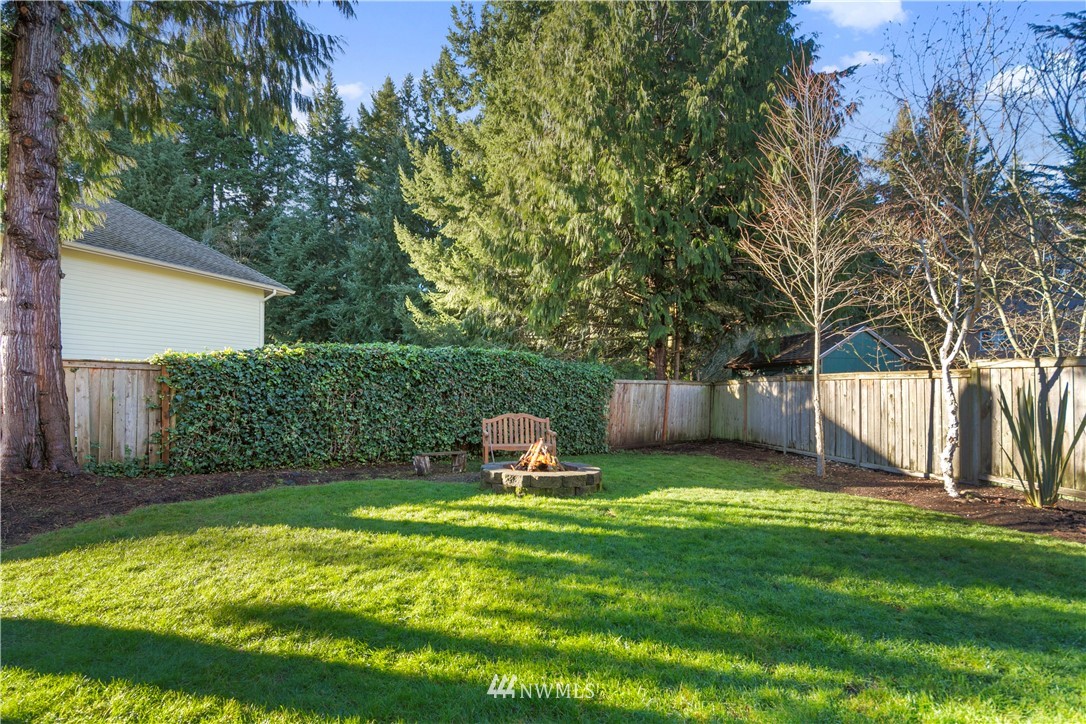 3121 210th Street Southeast Bothell, WA 98021 - Photo 39 of 40 a backyard of a house with lots of green space