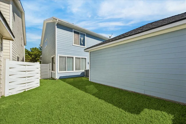 a view of a backyard with a garden