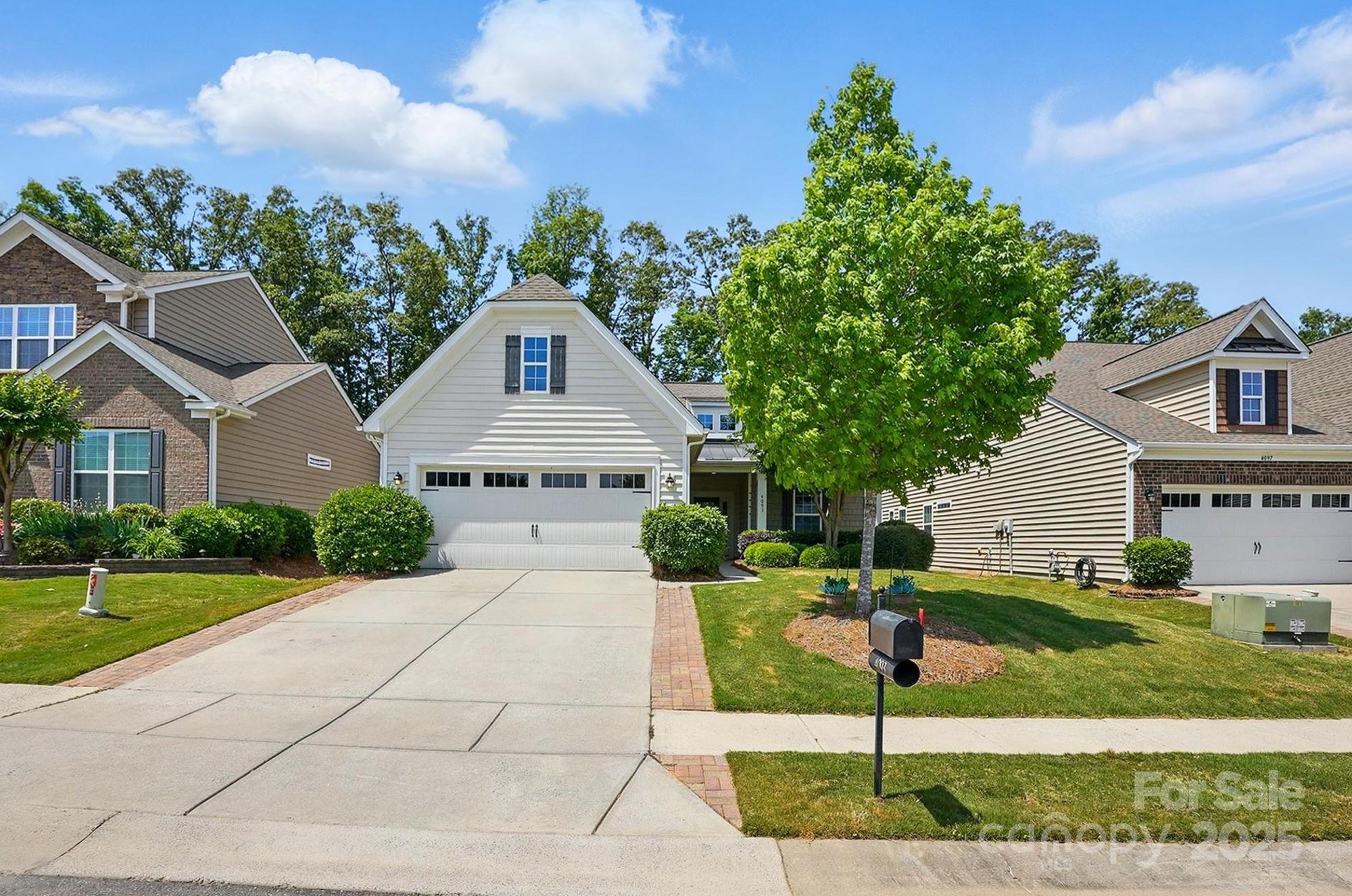 4093 Perth Road Fort Mill, SC 29707 - Photo 1 of 26 a front view of a house with a yard