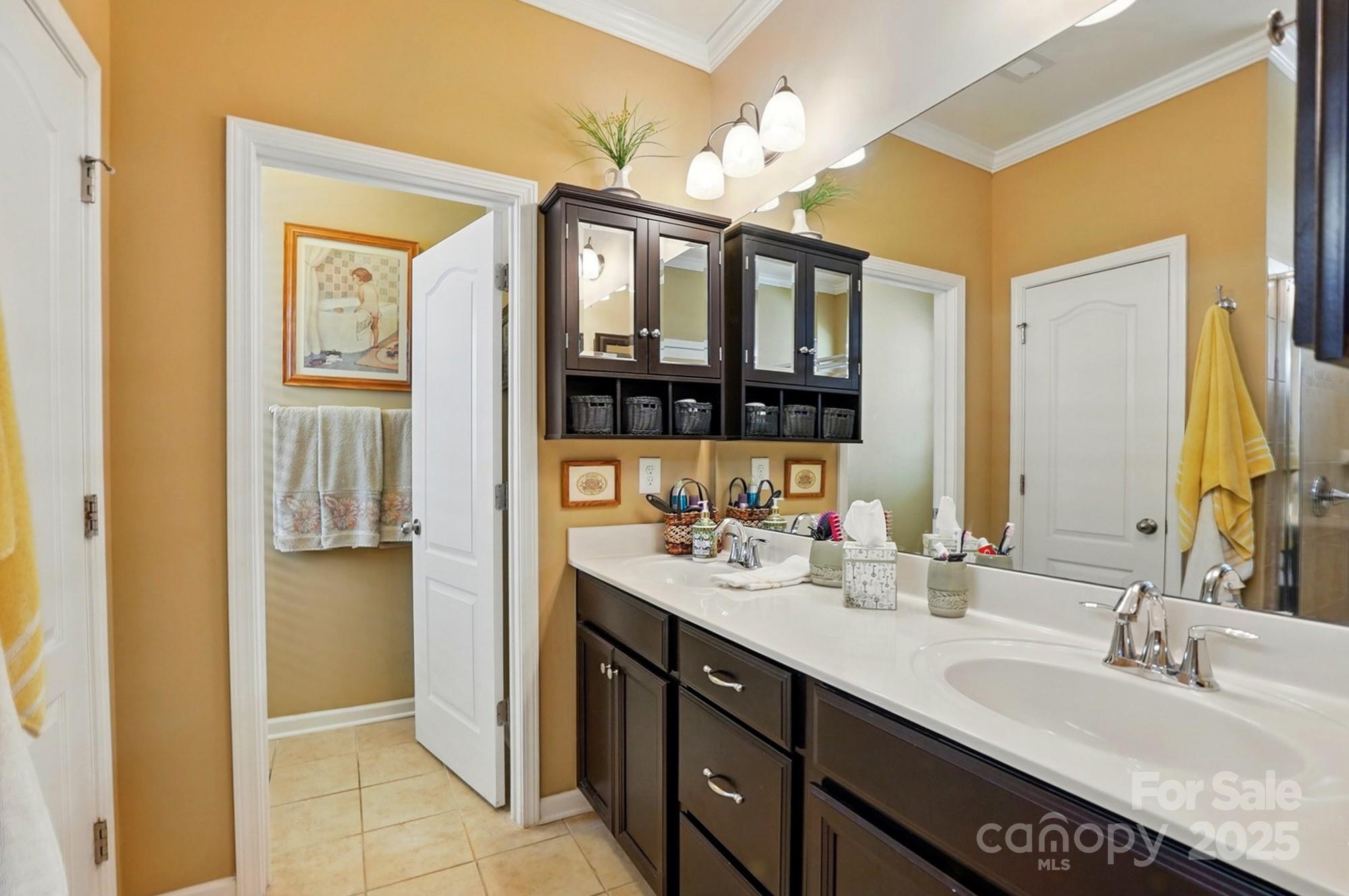 4093 Perth Road Fort Mill, SC 29707 - Photo 18 of 26 a spacious bathroom with a double vanity sink and a mirror