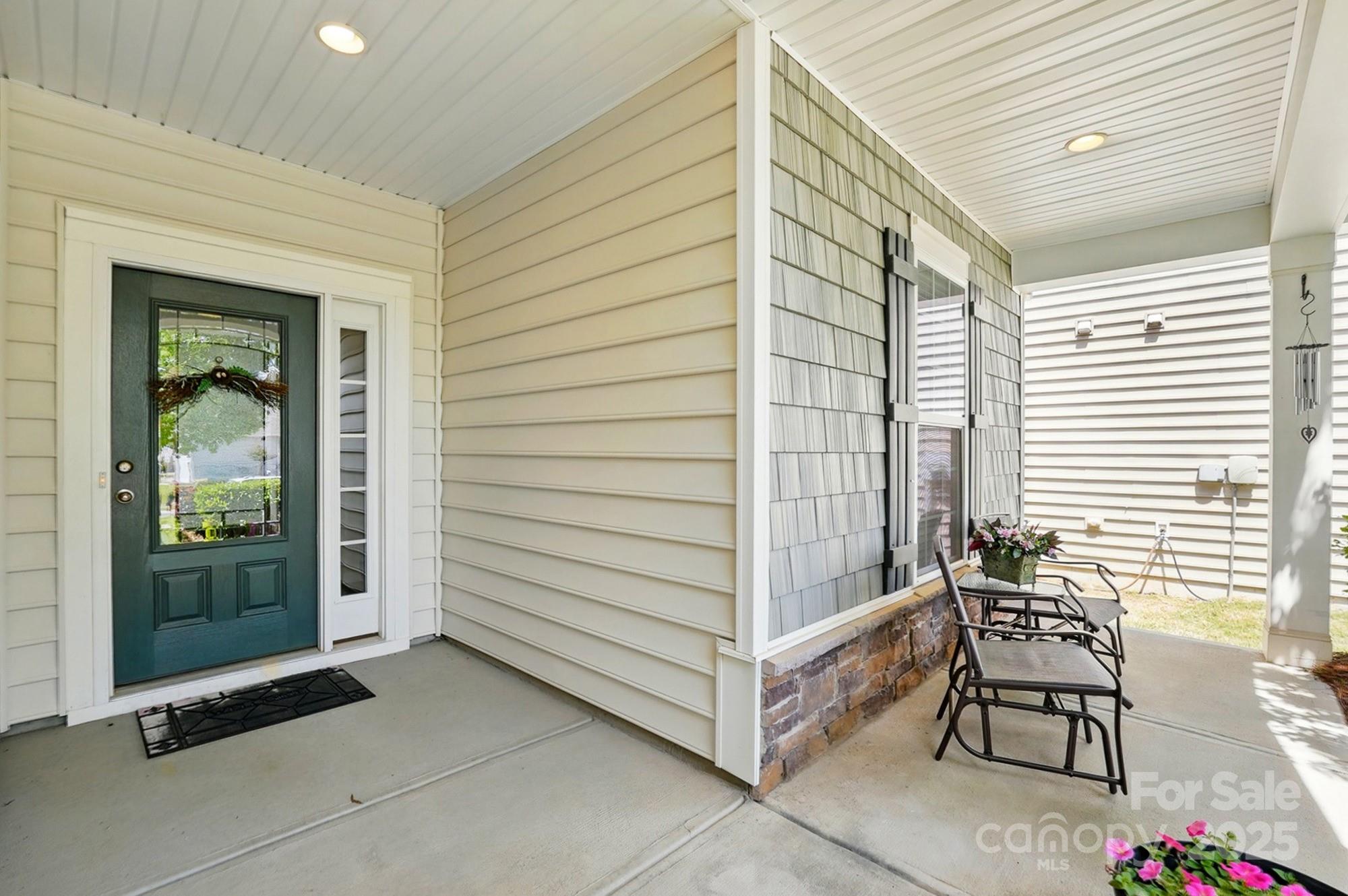 4093 Perth Road Fort Mill, SC 29707 - Photo 3 of 26 a view of balcony with two chairs and a potted plant