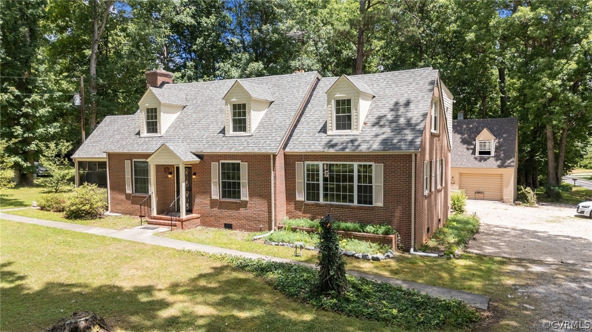 front view of a house with a yard