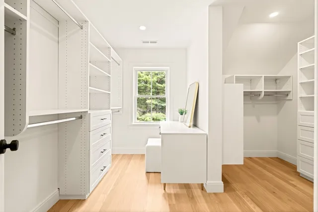 a view of walk in closet with window